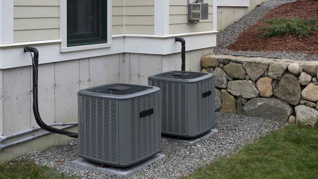 Stone wall around AC unit